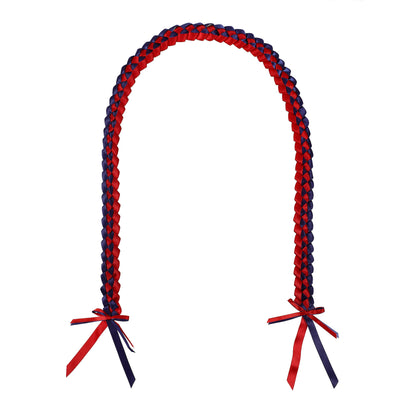 Bright ribbon graduation lei styled with cap and gown outfit